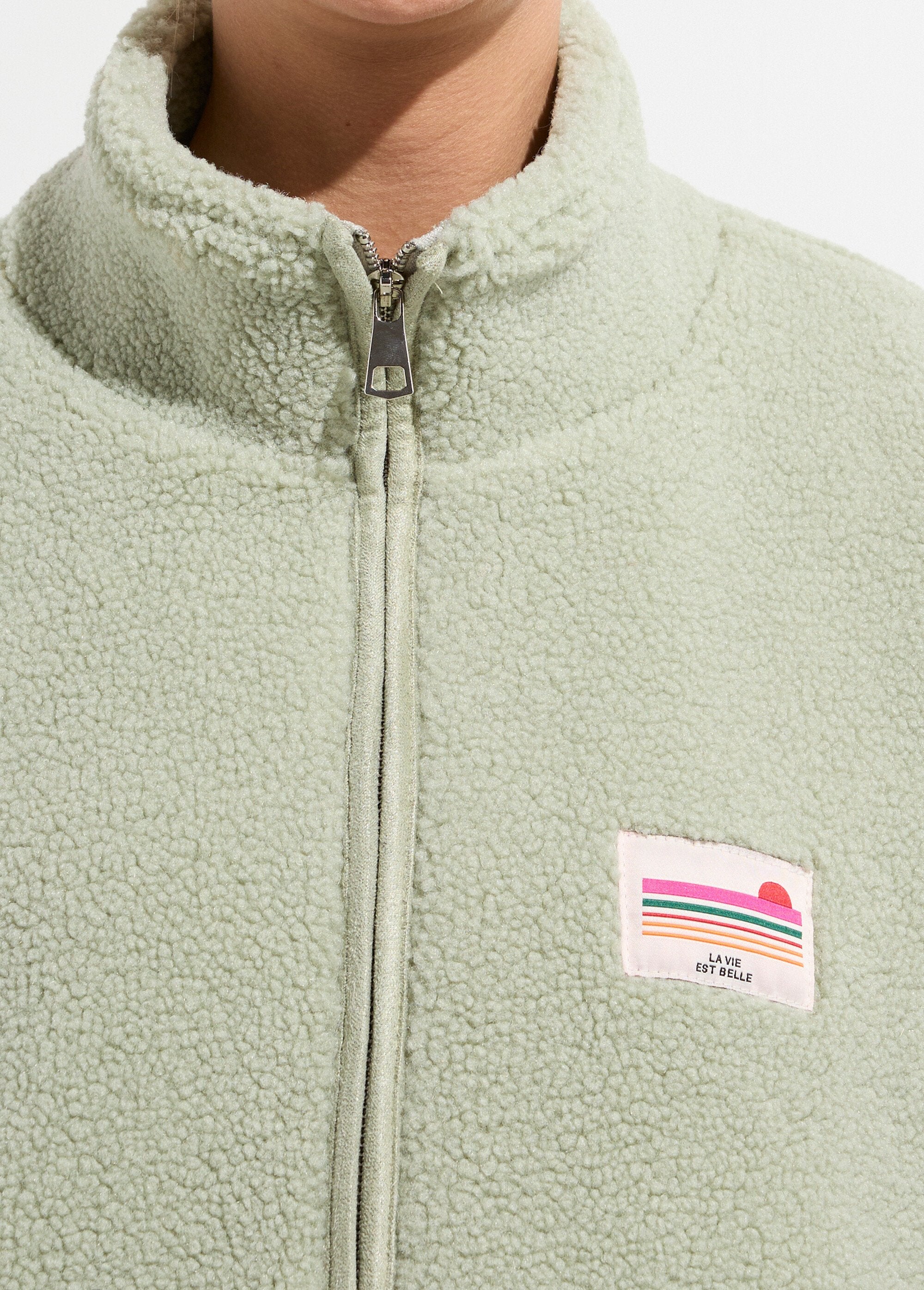 Warm_fleece_zip-up_vest,_high_collar_Almond_green_DE1_slim