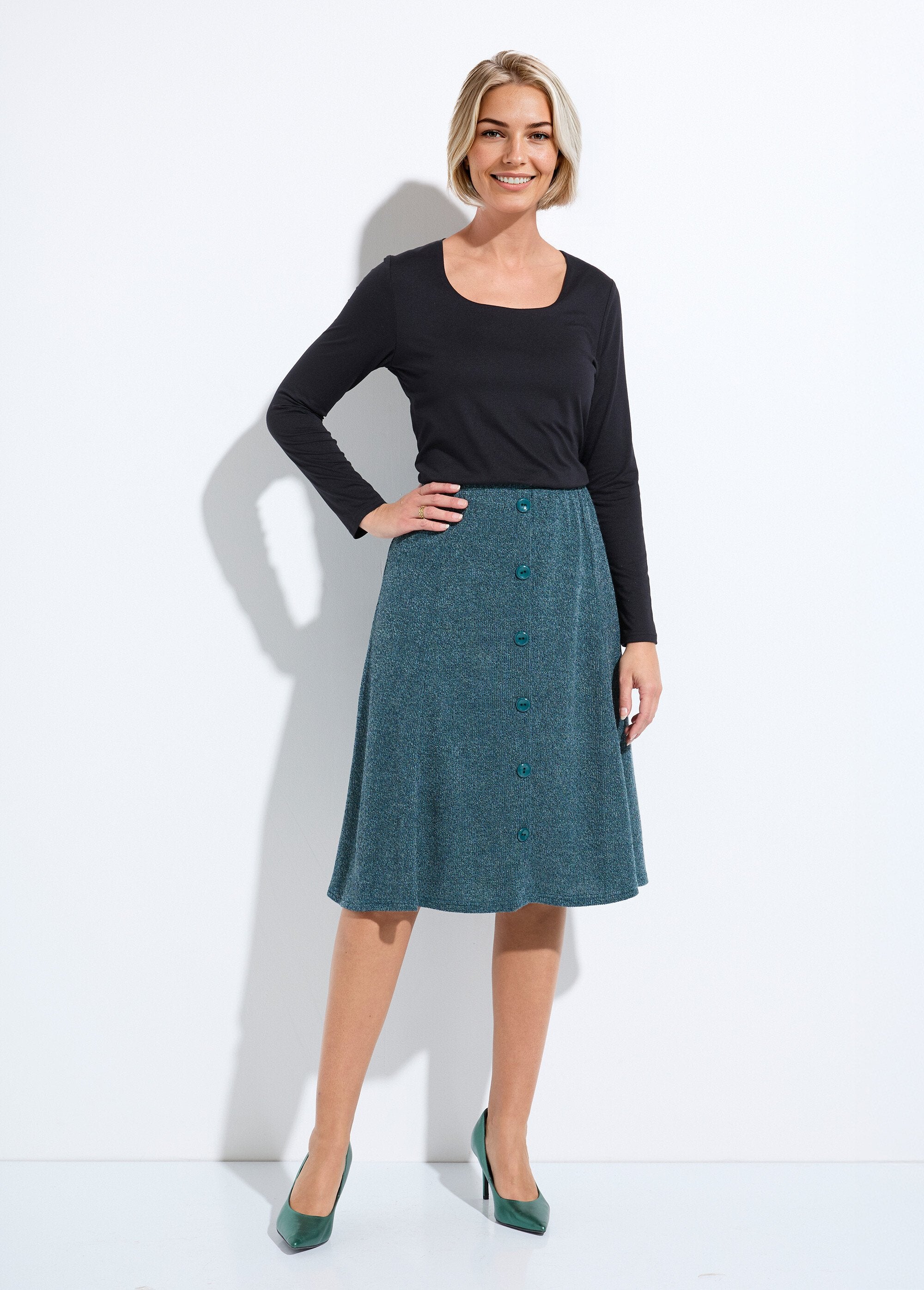 Mid-length_flared_skirt_in_plain_warm_knit_Green_SF1_slim