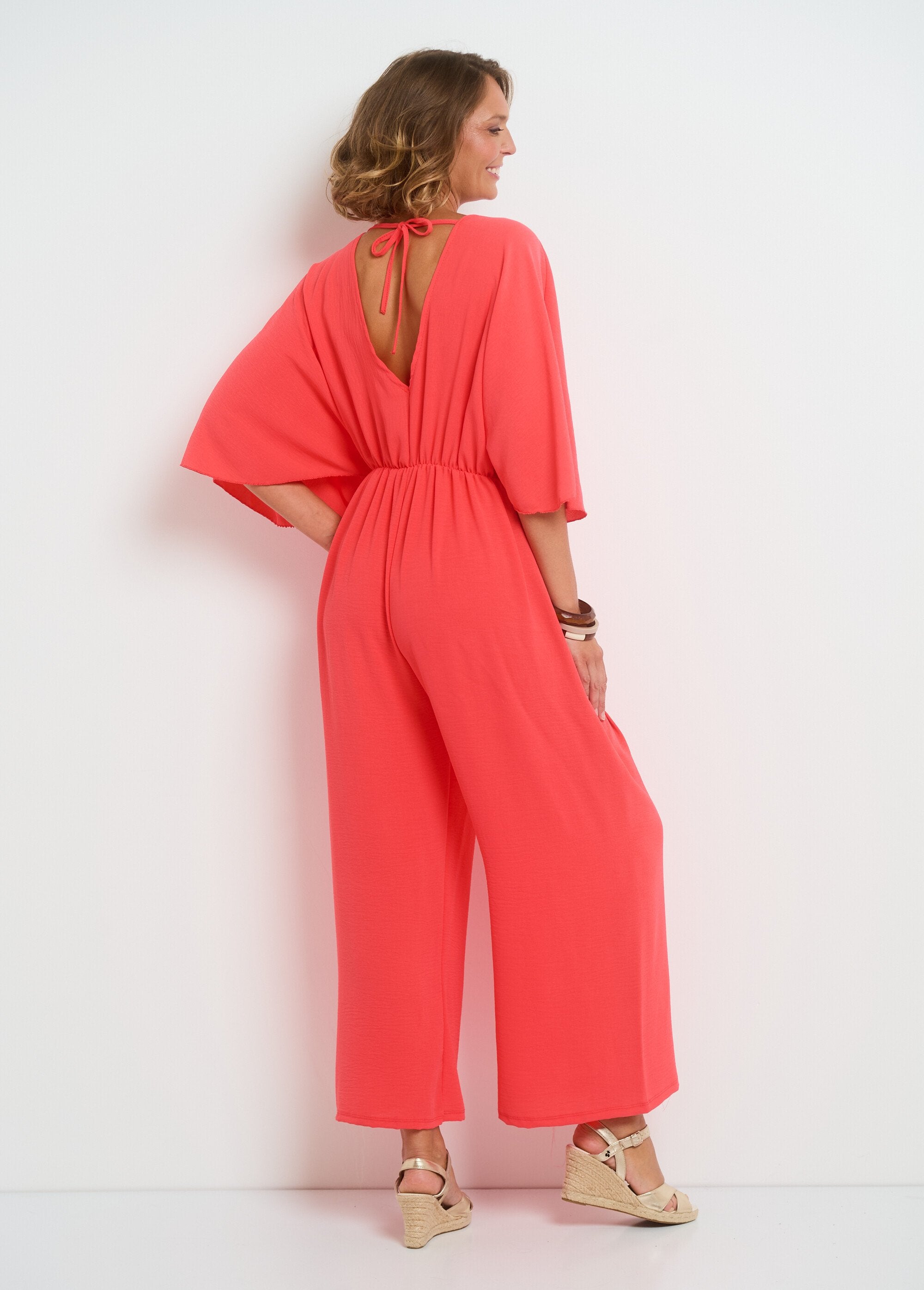 Fluid_V-neck_jumpsuit_with_tie_back_Coral_DO1_slim